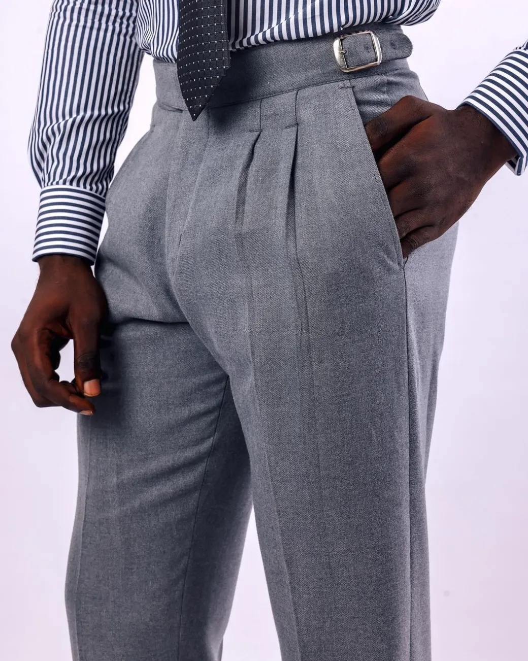 A Light grey, double pleat with side metal adjuster Gurkha pant