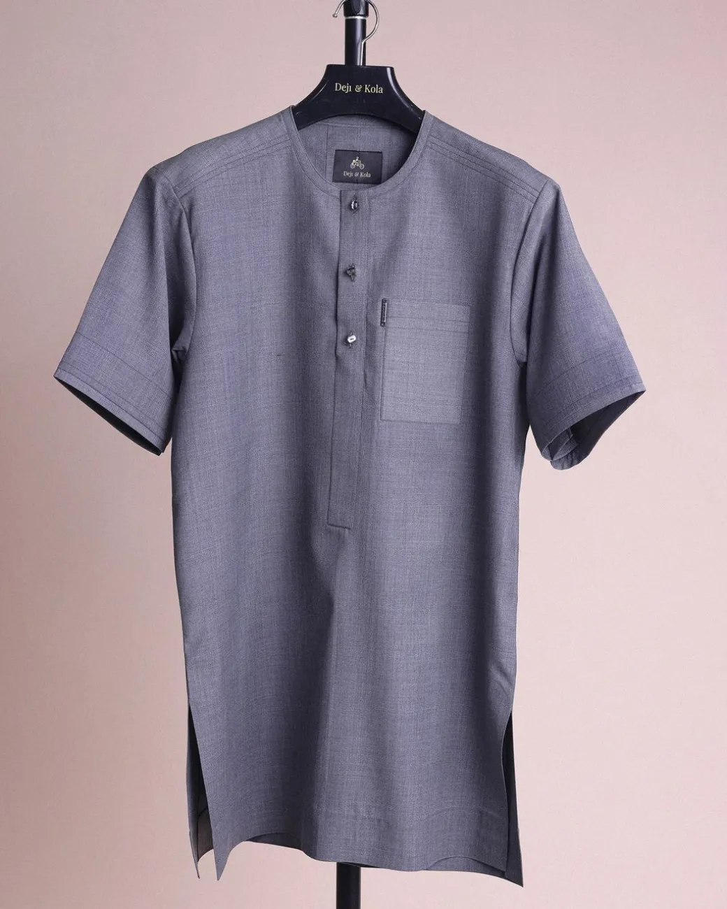 A Light grey, front flap with matching Swarovski button details, short sleeve African senator kaftan native.