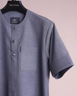 A Light grey, front flap with matching Swarovski button details, short sleeve African senator kaftan native.