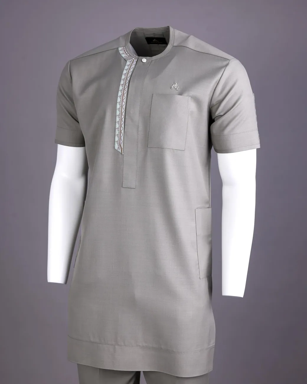 A Light grey, front flap with silver studded Swarovski buttons, left drop Arewa embroidery, short sleeve African senator kaftan native