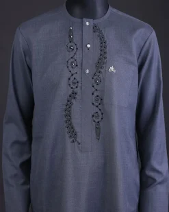 A Light grey, patterned floral embroidery details with black Swarovski stone details, silver button, long sleeve kaftan and Sokoto