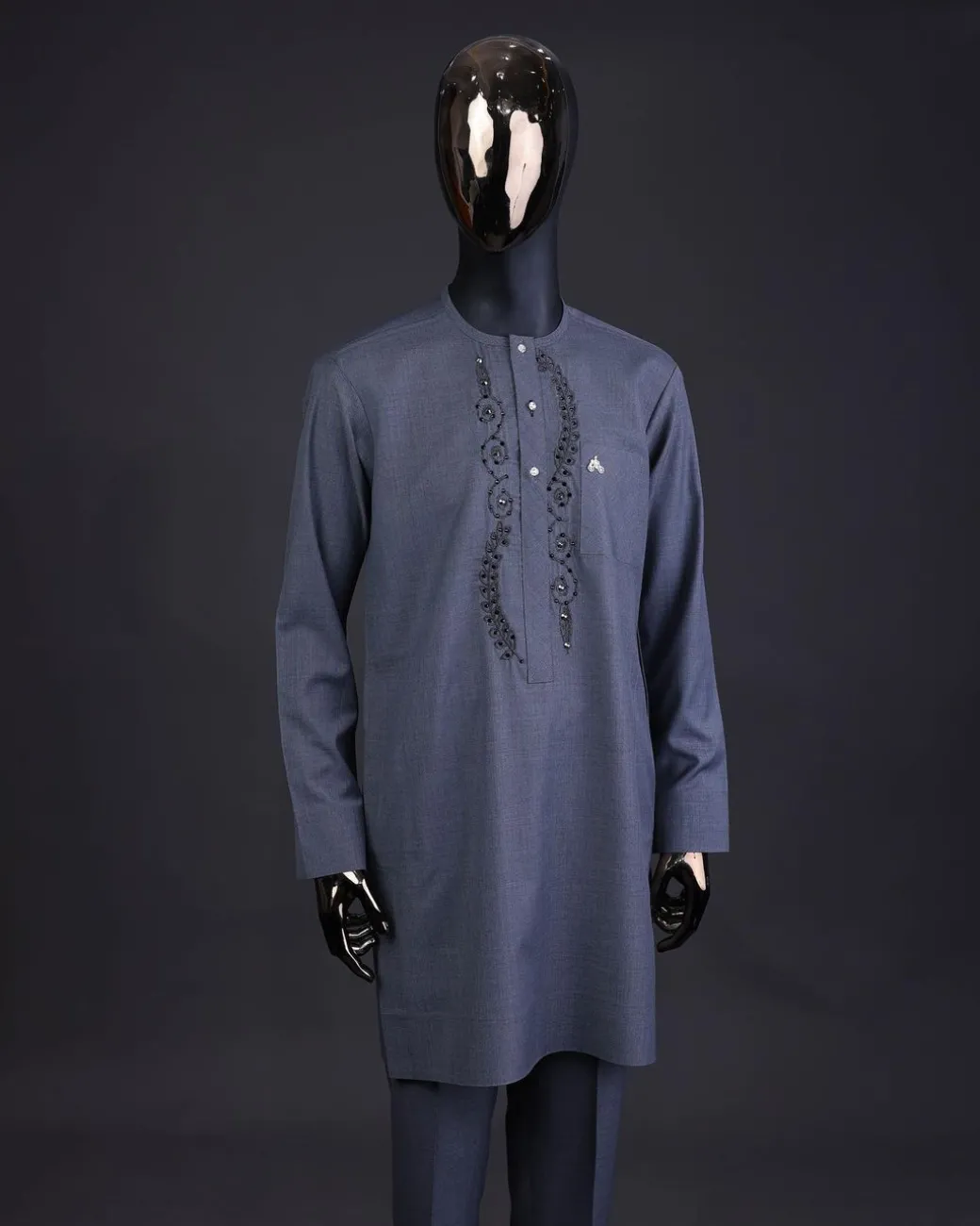A Light grey, patterned floral embroidery details with black Swarovski stone details, silver button, long sleeve kaftan and Sokoto