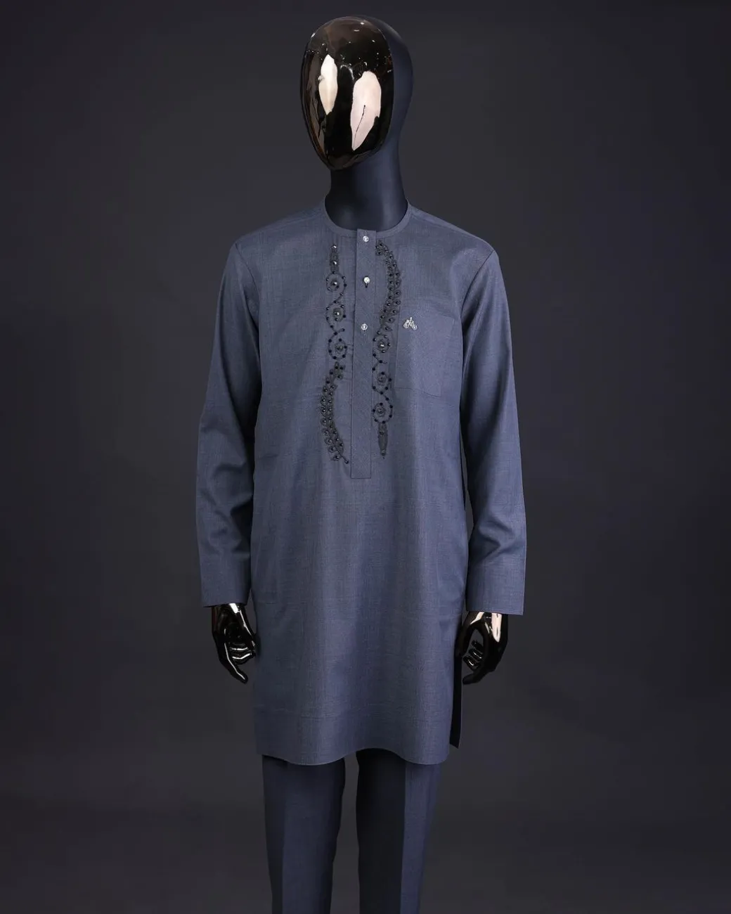A Light grey, patterned floral embroidery details with black Swarovski stone details, silver button, long sleeve kaftan and Sokoto