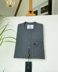 A light grey stripe front flap, Swarovski stone button with a maze line design African kaftan