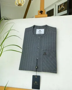 A light grey stripe front flap, Swarovski stone button with a maze line design African kaftan