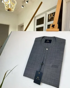 A light Irish Grey kaftan with clear view pearl Swarovski button and sokoto