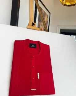 A lipstick red, patch pocket, front flap with clear view lipstick red Swarovski button details African Kaftan