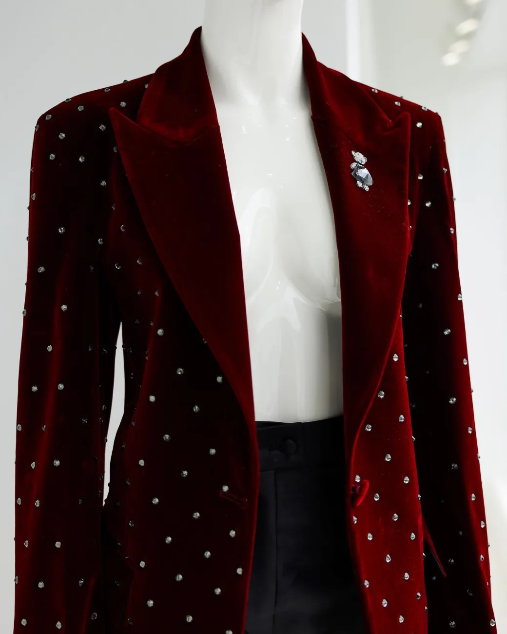 A Lipstick Red, Soaked Velvet Peak Lapel Suit.