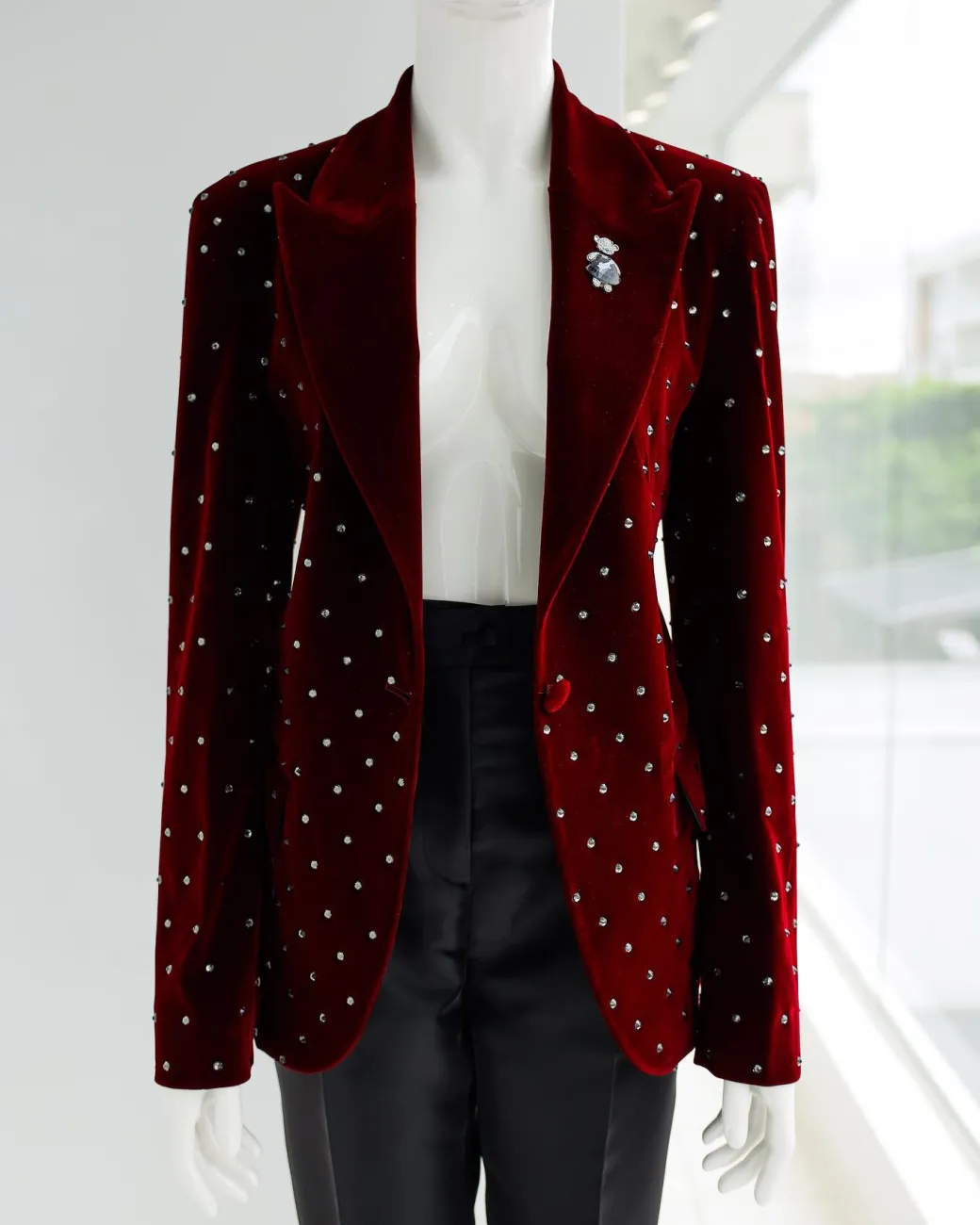 A Lipstick Red, Soaked Velvet Peak Lapel Suit.