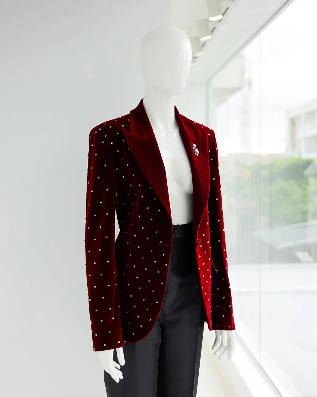 A Lipstick Red, Soaked Velvet Peak Lapel Suit.
