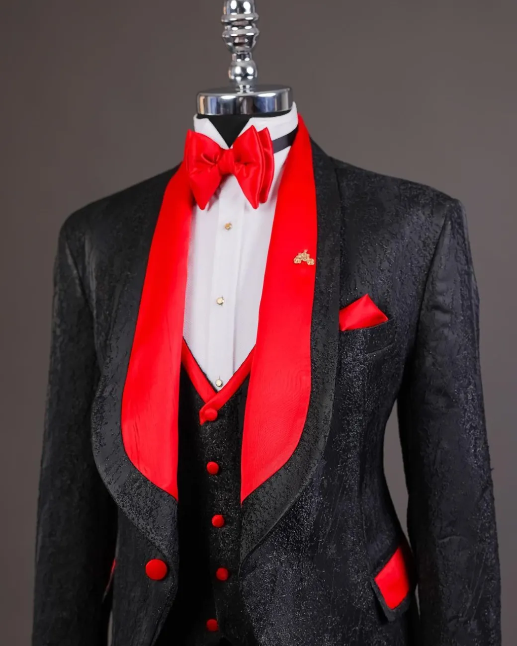 A “Luminati” dispersed ruffle metallic jacquard tuxedo suit
