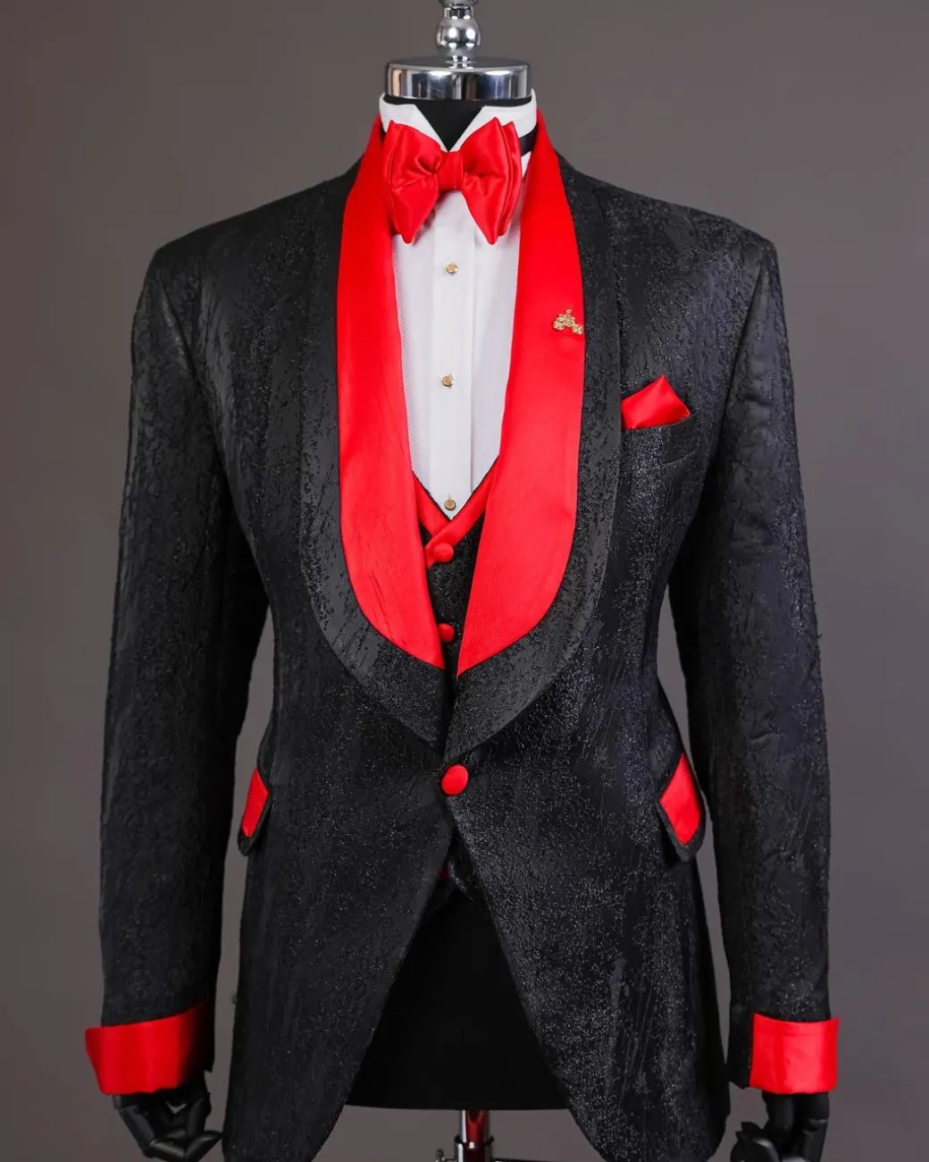 A “Luminati” dispersed ruffle metallic jacquard tuxedo suit