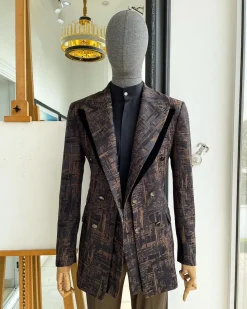 A “Made In Lagos”, Quad peak lapel, triple breasted metallic jacquard blazer suit