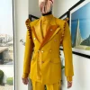 A “Made in Lagos” Wing Flare, Quad peak lapel, triple breasted metallic jacquard blazer suit