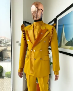 A “Made in Lagos” Wing Flare, Quad peak lapel, triple breasted metallic jacquard blazer suit