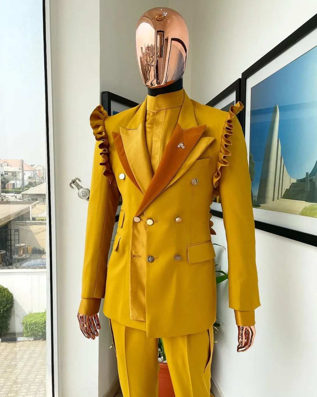 A “Made in Lagos” Wing Flare, Quad peak lapel, triple breasted metallic jacquard blazer suit