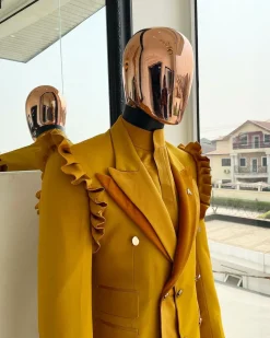 A “Made in Lagos” Wing Flare, Quad peak lapel, triple breasted metallic jacquard blazer suit