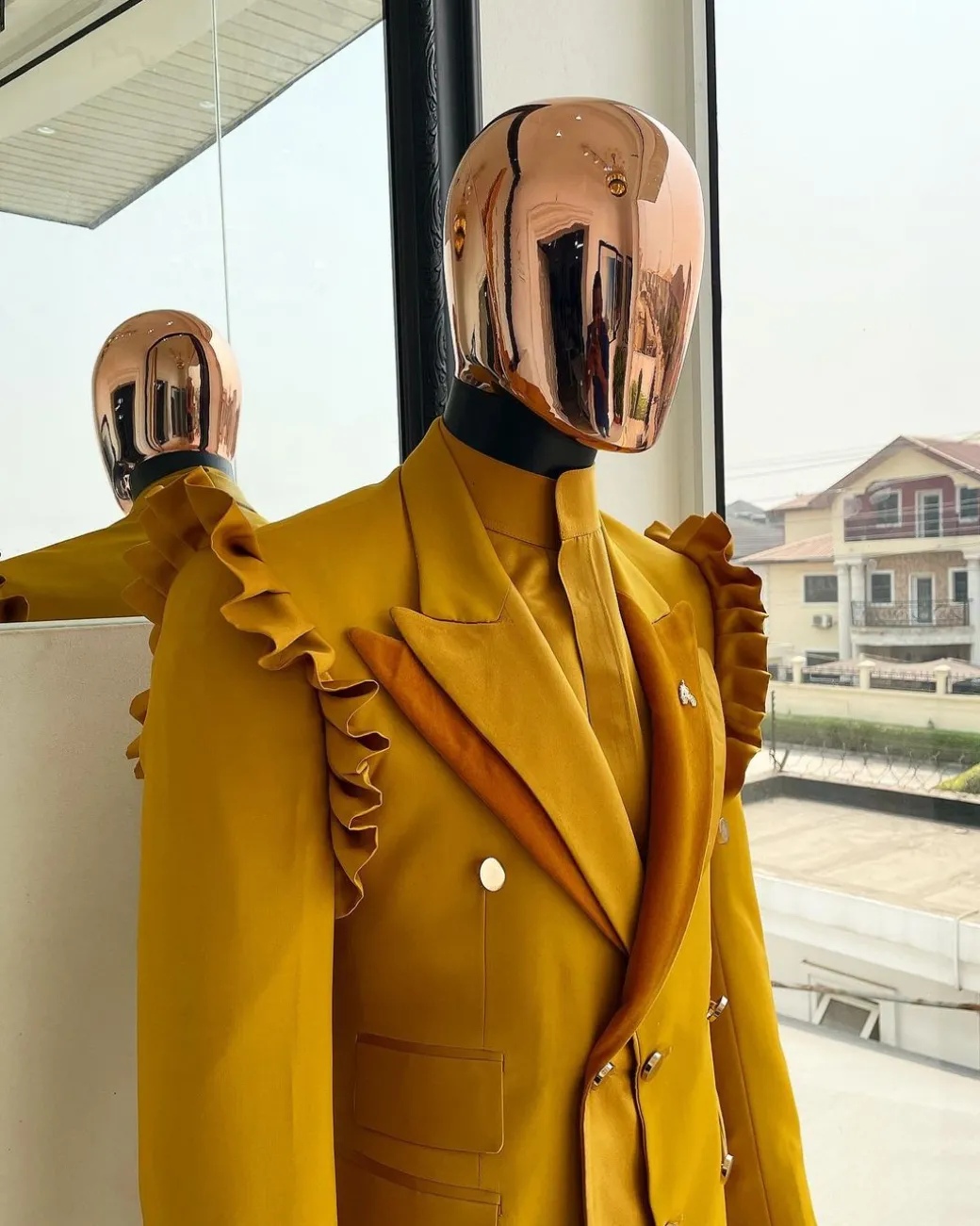 A “Made in Lagos” Wing Flare, Quad peak lapel, triple breasted metallic jacquard blazer suit