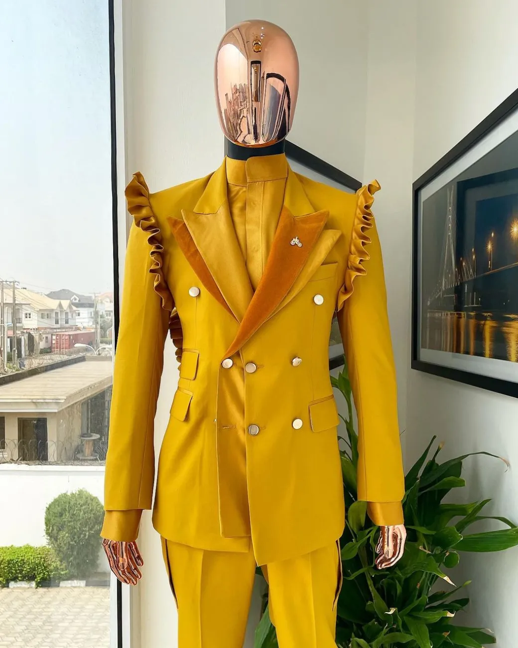 A “Made in Lagos” Wing Flare, Quad peak lapel, triple breasted metallic jacquard blazer suit