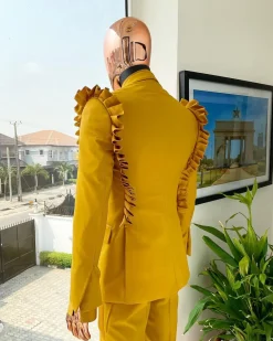 A “Made in Lagos” Wing Flare, Quad peak lapel, triple breasted metallic jacquard blazer suit