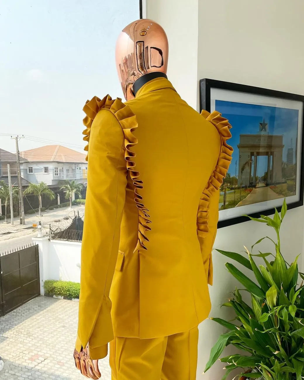 A “Made in Lagos” Wing Flare, Quad peak lapel, triple breasted metallic jacquard blazer suit
