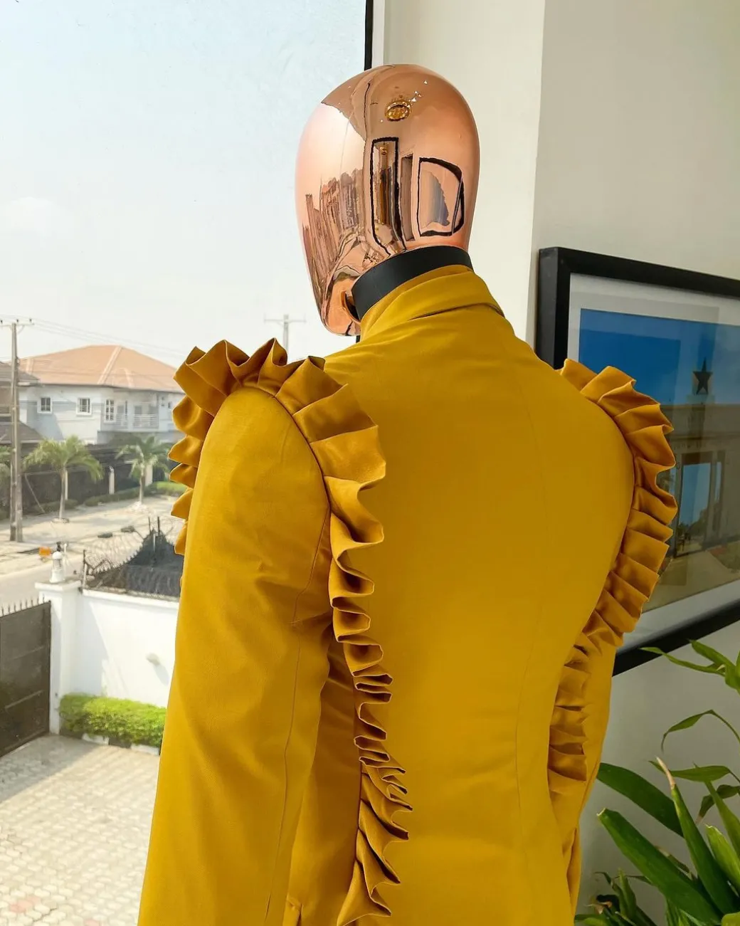A “Made in Lagos” Wing Flare, Quad peak lapel, triple breasted metallic jacquard blazer suit