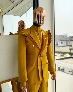 A “Made in Lagos” Wing Flare, Quad peak lapel, triple breasted metallic jacquard blazer suit
