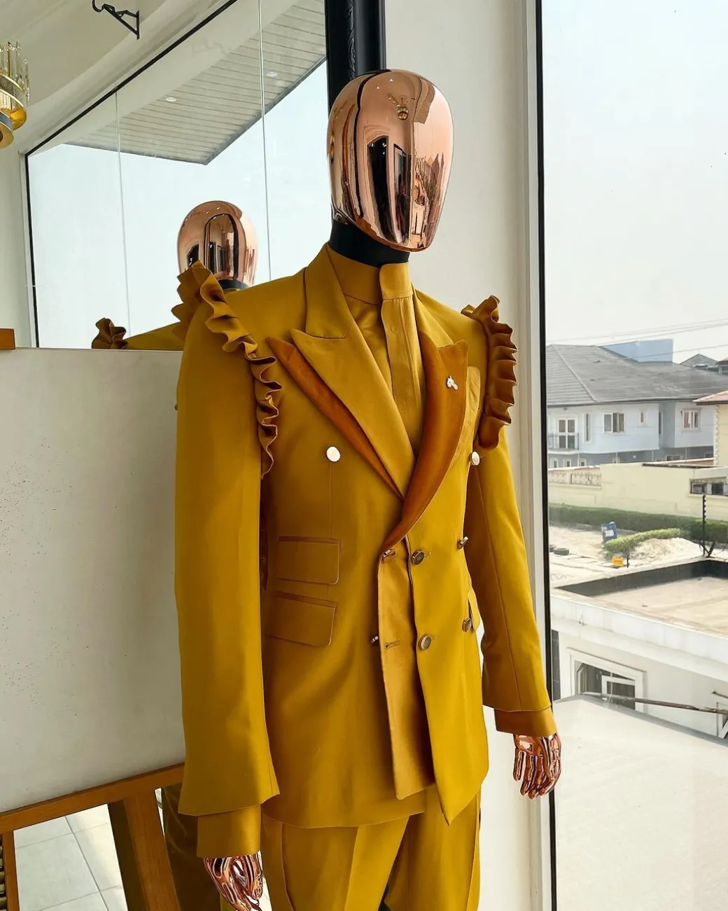 A “Made in Lagos” Wing Flare, Quad peak lapel, triple breasted metallic jacquard blazer suit