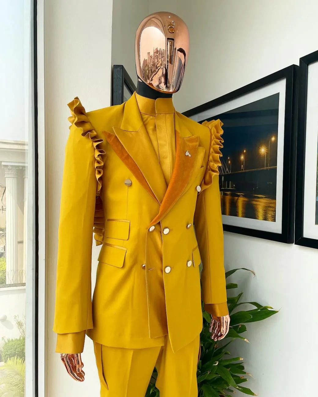 A “Made in Lagos” Wing Flare, Quad peak lapel, triple breasted metallic jacquard blazer suit