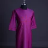 A Magenta, herringbone fabric, and interconnected ring embroidery details African senator kaftan native