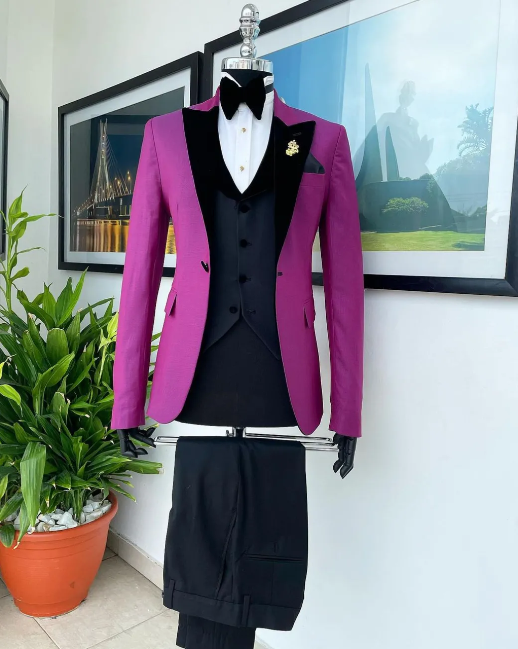 A Magenta, one button, peak lapel tuxedo jacquard suit.