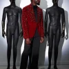 A Mahogany red shawl lapel tuxedo with black and octagonal laser-cut matching Swarovski stones suit