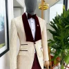 A “Mandarin” dispersed gold ruffle pattern burgundy shawl lapel jacquard suit