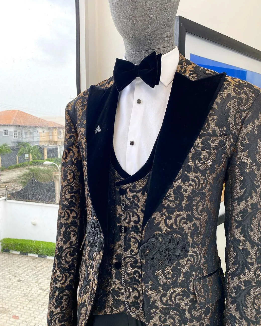 A “Mandarin” floral black and tortilla brown Peak Lapel with black soaked Italian velvet