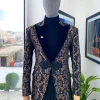 A “Mandarin” Peak Lapel with black soaked Italian velvet, Chinese button suit