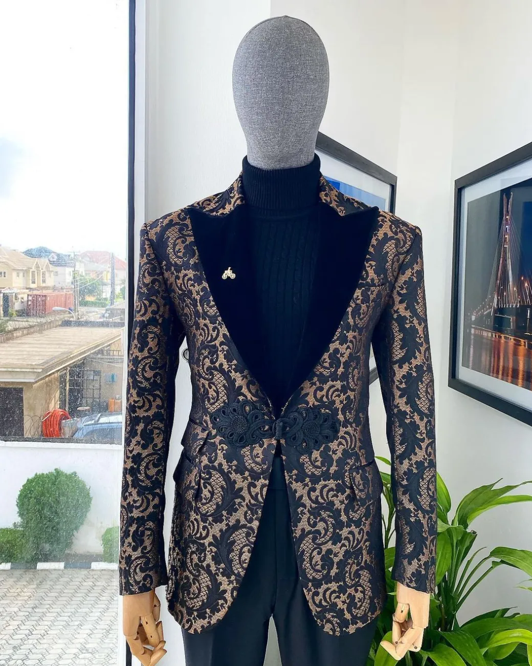 A “Mandarin” Peak Lapel with black soaked Italian velvet, Chinese button suit