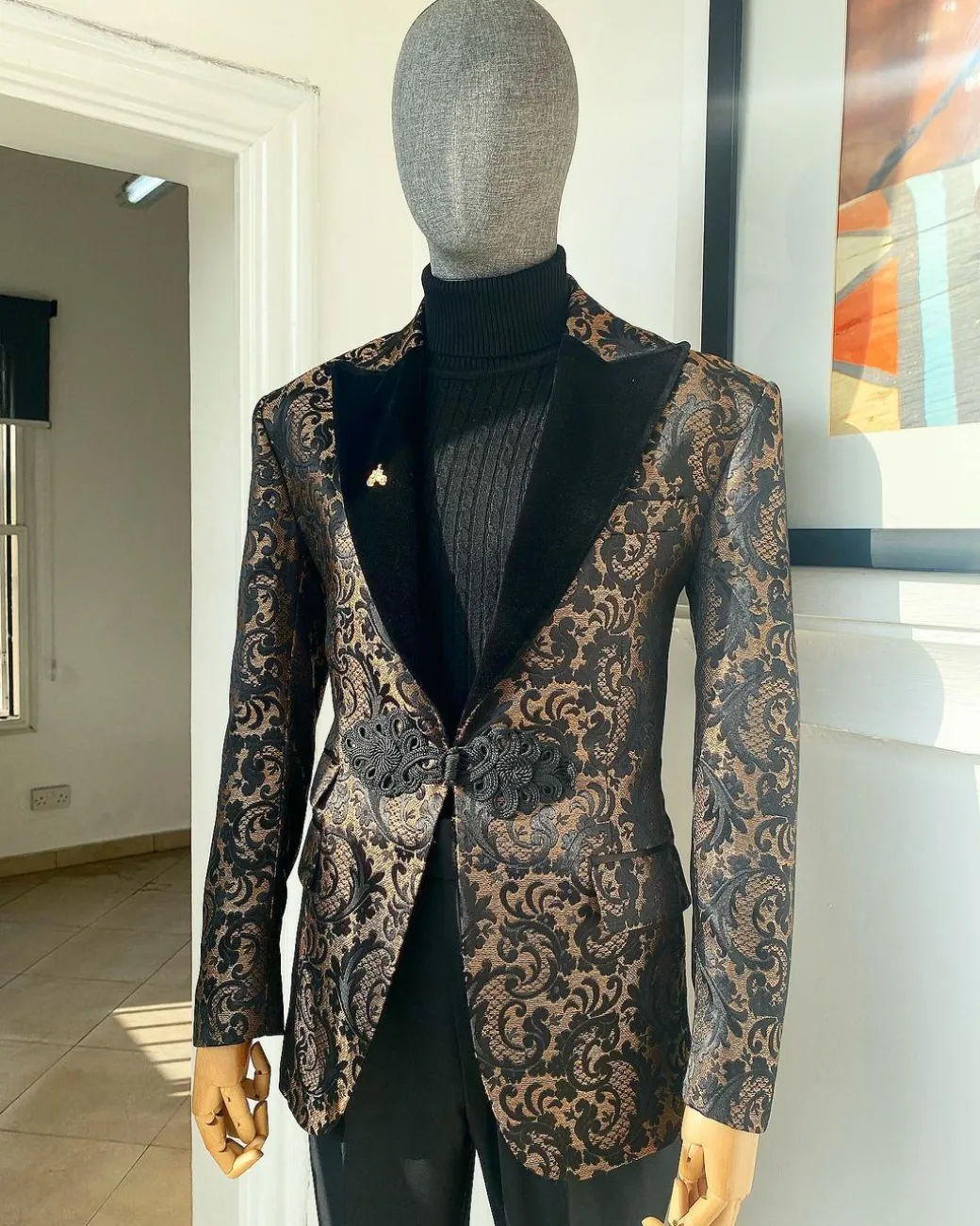 A “Mandarin” Peak Lapel with black soaked Italian velvet, Chinese button suit