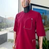 A Maroon red, combat pocket gold zip detailing african traditional senator kaftan native