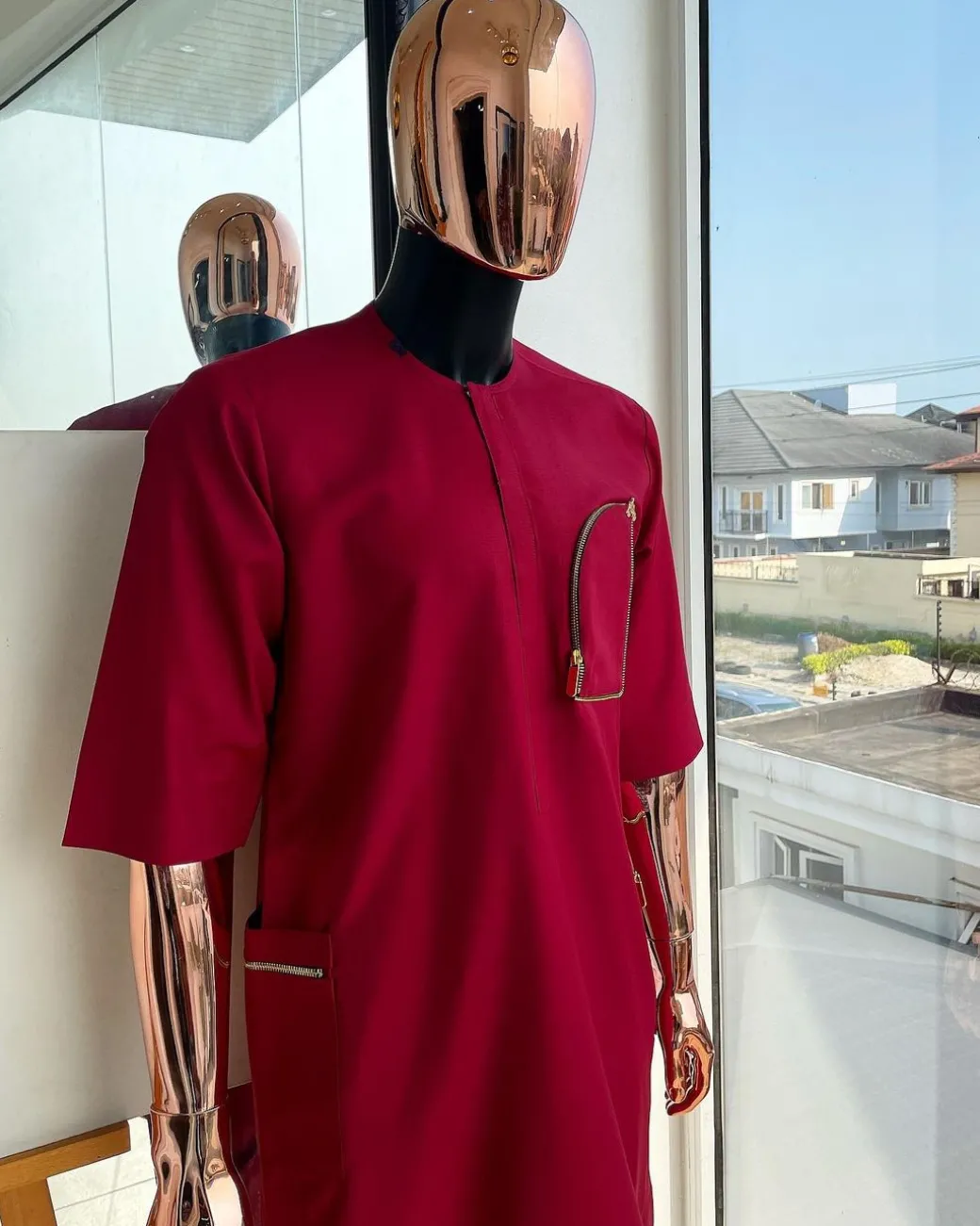A Maroon red, combat pocket gold zip detailing african traditional senator kaftan native