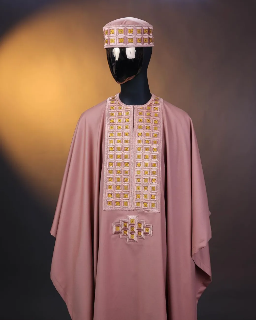 A Mauve, connected square embroidery design with matching gold Swarovski stone details agbada