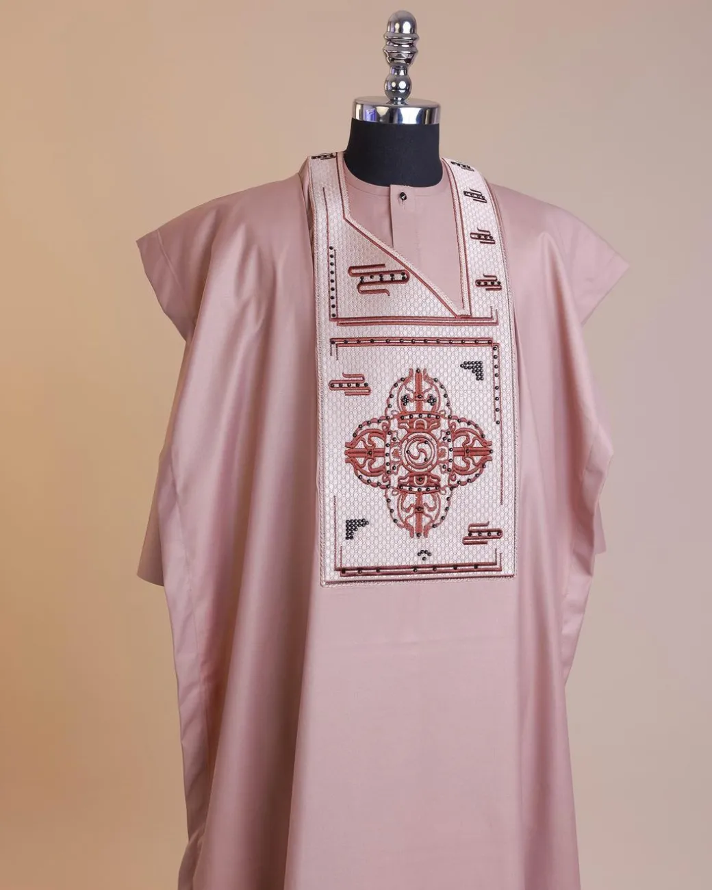 A Mauve, Machine Cluster Embroidery Design With Black Swarovski Stone Details Agbada.