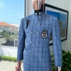 A Maya and steel blue windowpane check “preacher” double breasted safari suit
