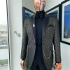A metallic coarse and geometric pattern jacquard peak lapel dinner suit