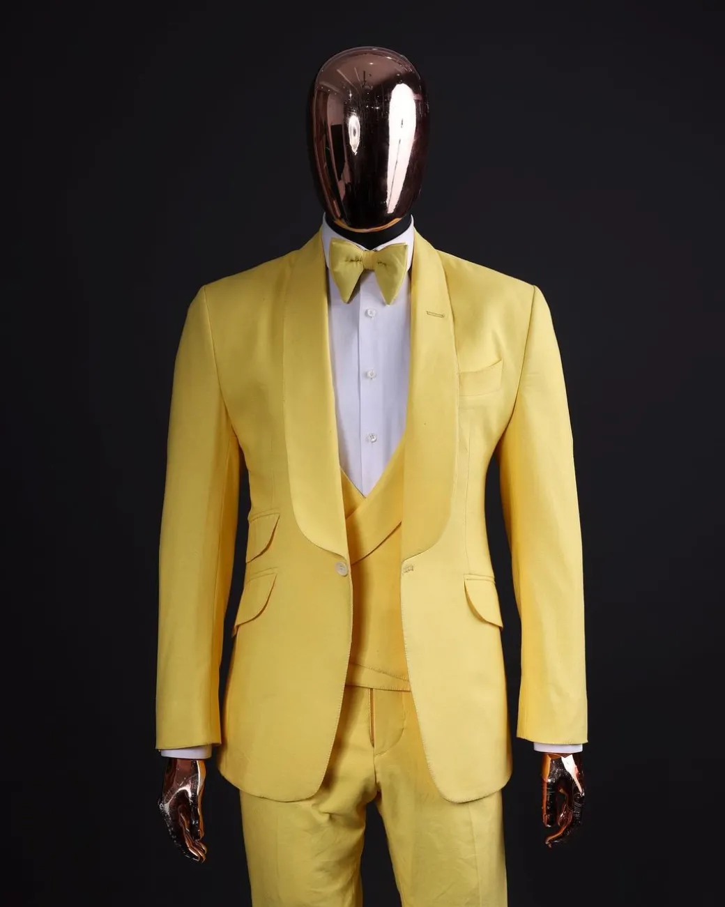 A Middle yellow linen shawl lapel jacket, cross cut unbalanced wrapped waistcoat, bow tie & Gurkha pant Trouser
