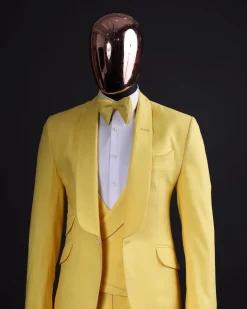 A Middle yellow linen shawl lapel jacket, cross cut unbalanced wrapped waistcoat, bow tie & Gurkha pant Trouser