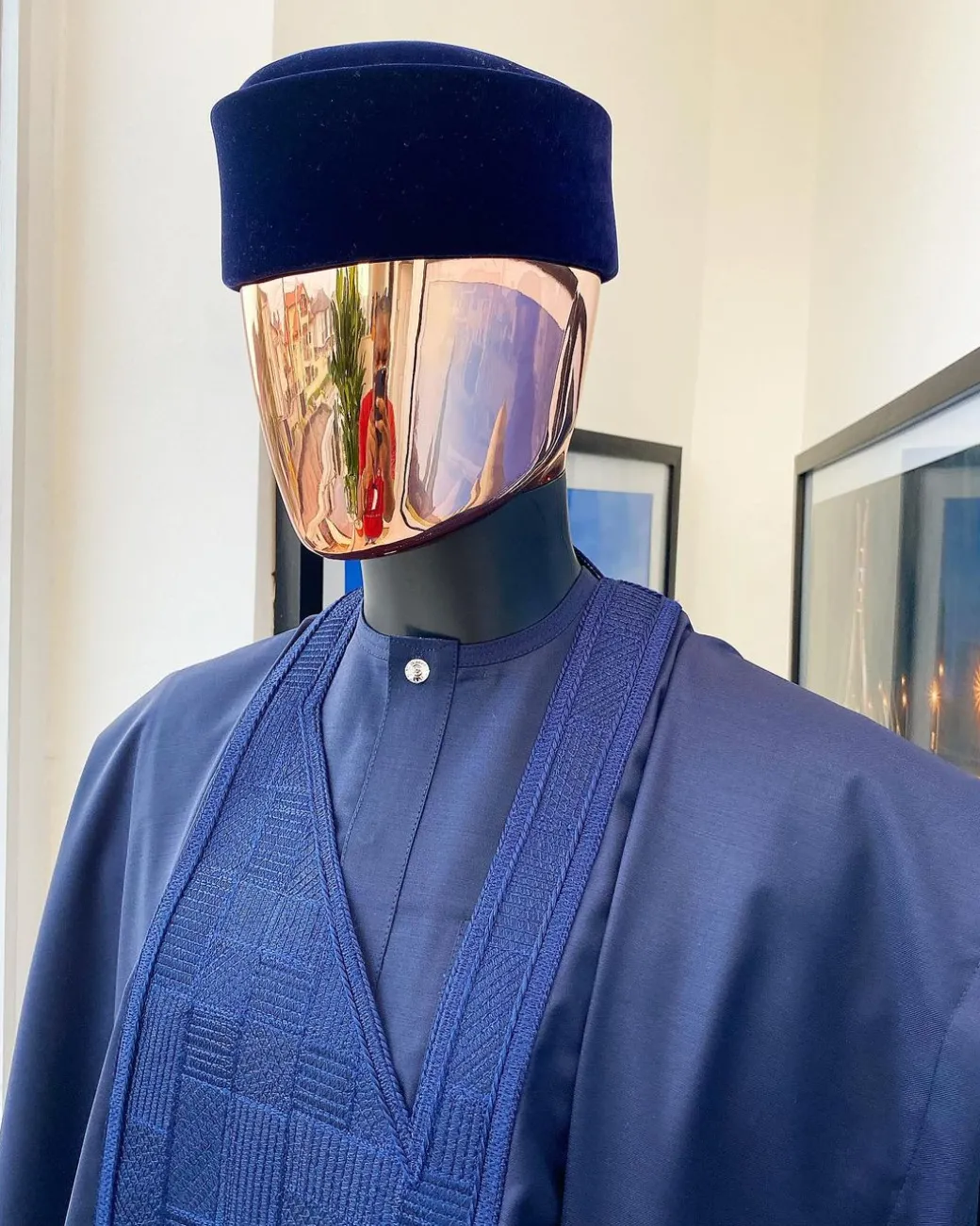 A Midnight Blue Agbada with a maze line Japanese intersection design, senator kaftan with Swarovski button details and sokoto