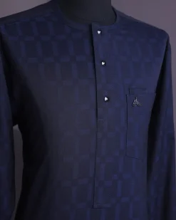 A Midnight blue, broken rectangle and square pattern, jorgecarli, front flap with black Swarovski button, long sleeve African senator kaftan native.