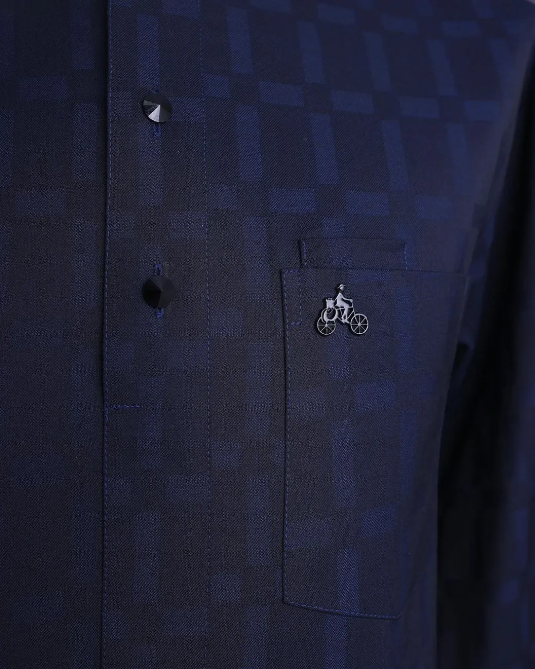 A Midnight blue, broken rectangle and square pattern, jorgecarli, front flap with black Swarovski button, long sleeve African senator kaftan native.