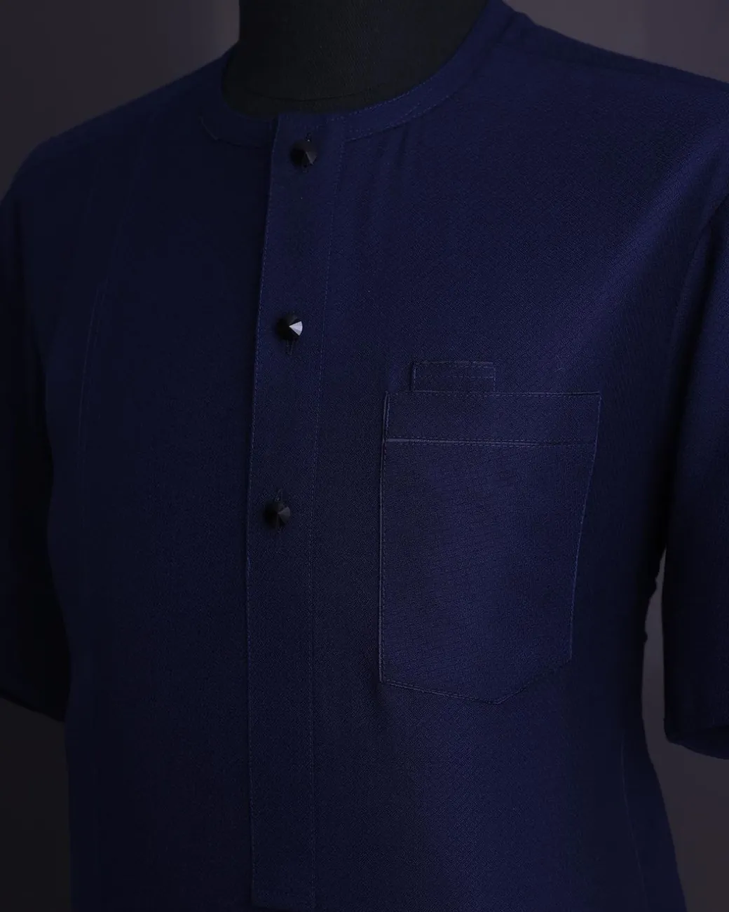 A Midnight blue, broken square pattern, Jorgecarli, front flap with black Swarovski button, 3/4 sleeve African senator Kaftan native.