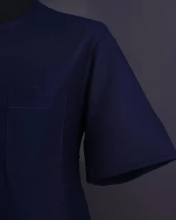 A Midnight blue, broken square pattern, Jorgecarli, front flap with black Swarovski button, 3/4 sleeve African senator Kaftan native.